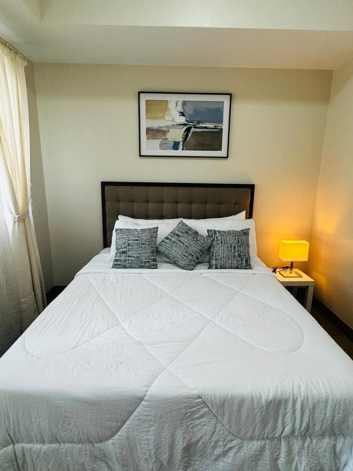 7FF Cozy 1BR Park McKinley West near BGC & Venice Mall
