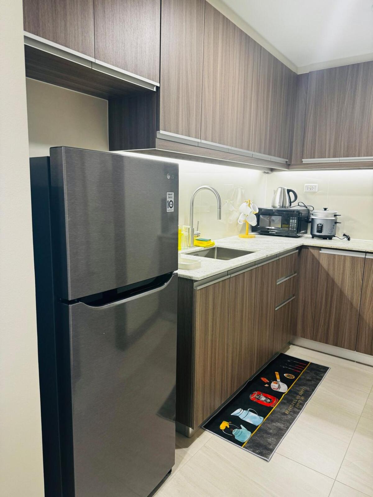7FF Cozy 1BR Park McKinley West near BGC & Venice Mall