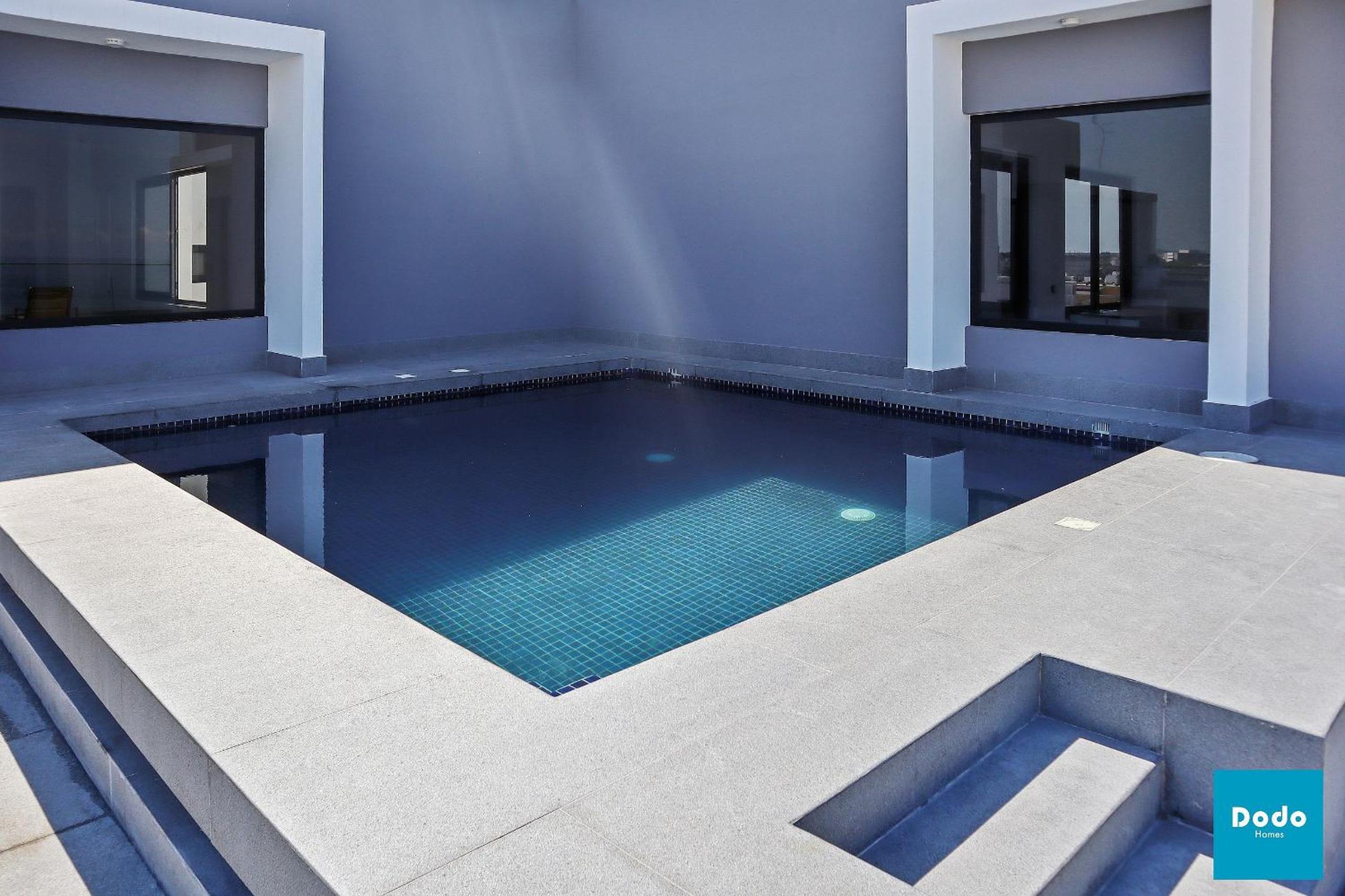 Torre con roof garden y piscina vista al mar
