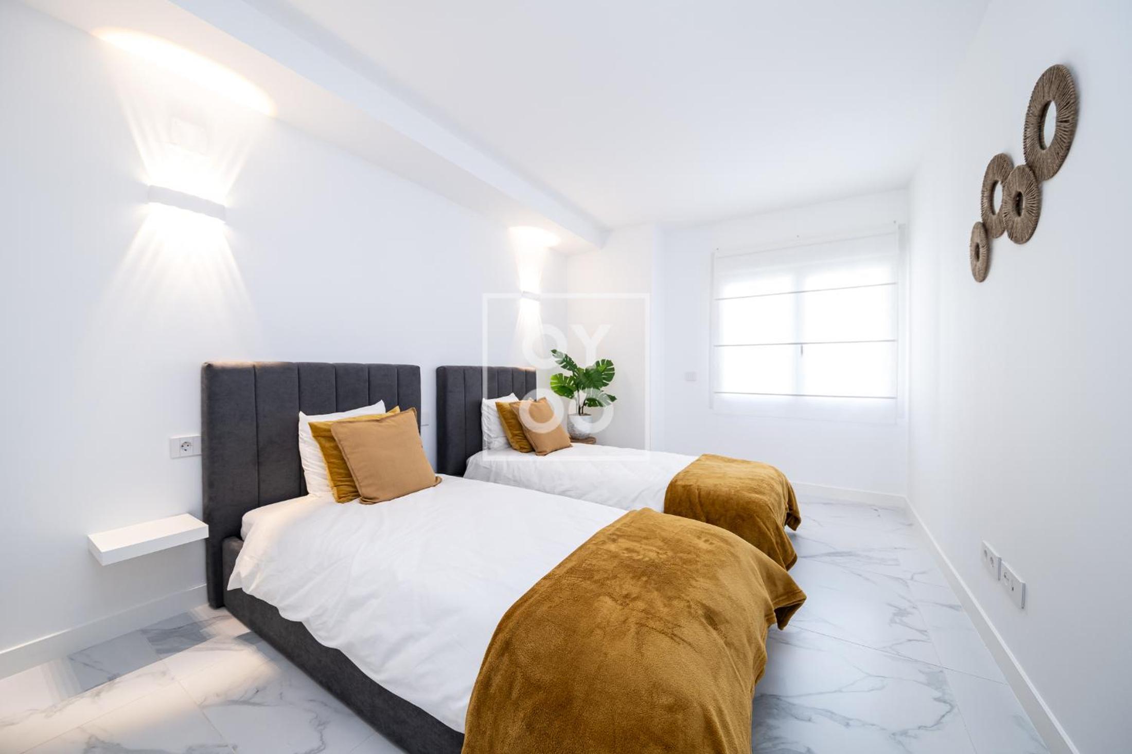 Infinity Blue groundfloor apt, beachfront, heated pool - by OYOOSTAYS