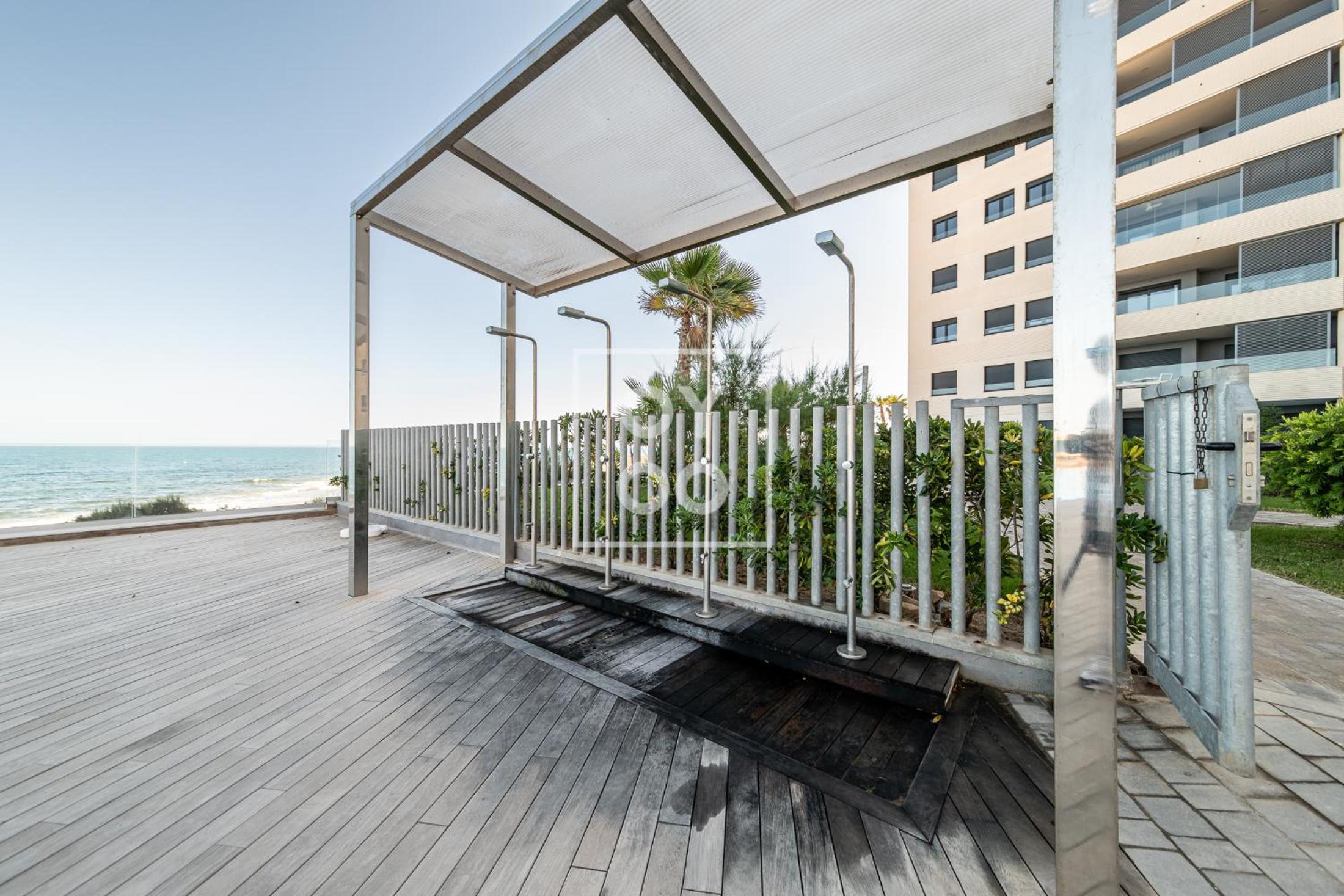 Infinity Blue groundfloor apt, beachfront, heated pool - by OYOOSTAYS