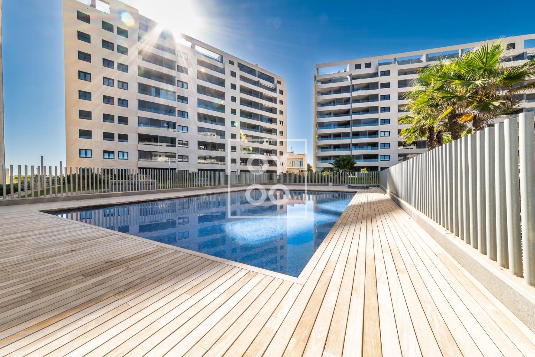 Infinity Blue groundfloor apt, beachfront, heated pool - by OYOOSTAYS