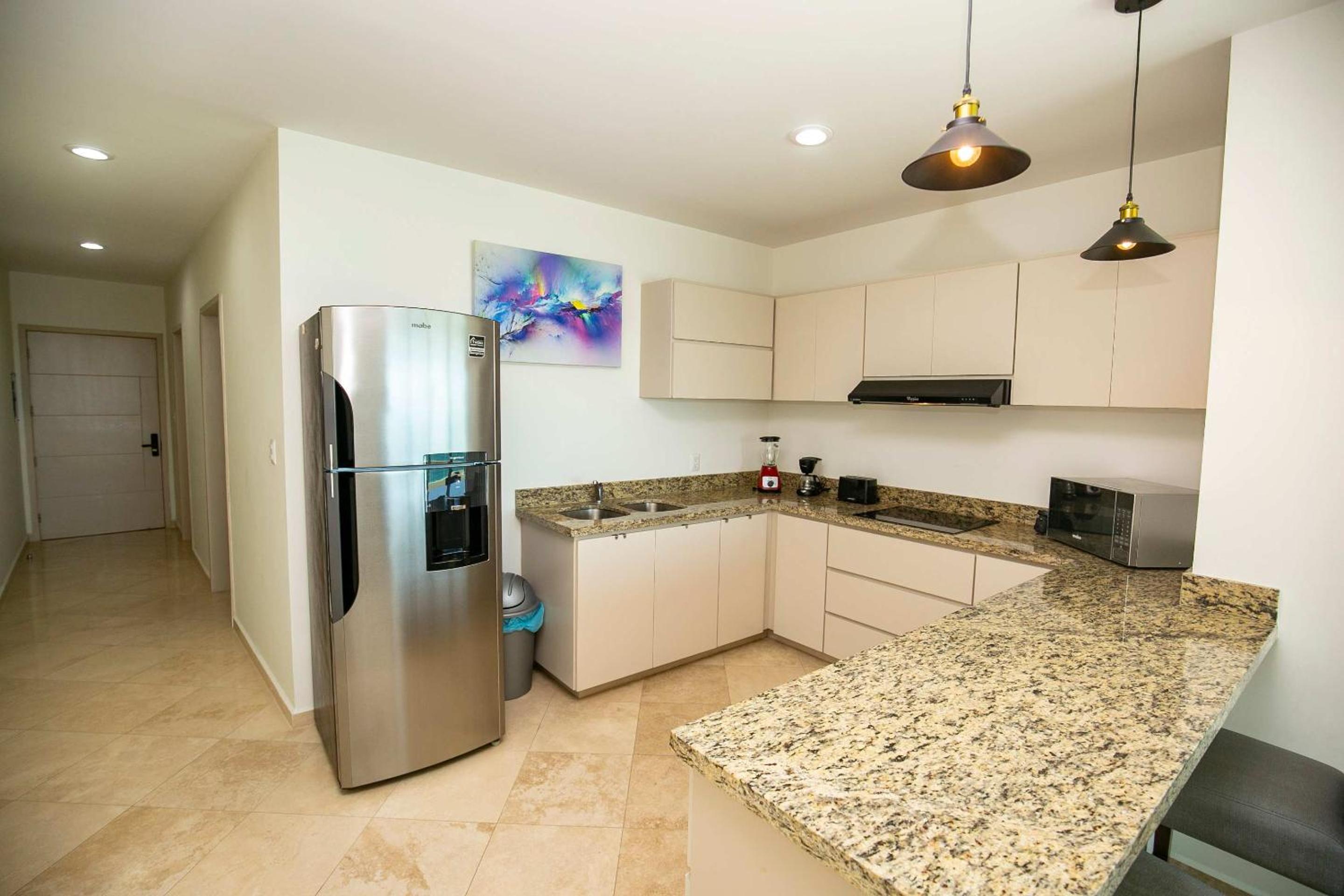 Elegant Condo at Playa Brujas with Ocean View