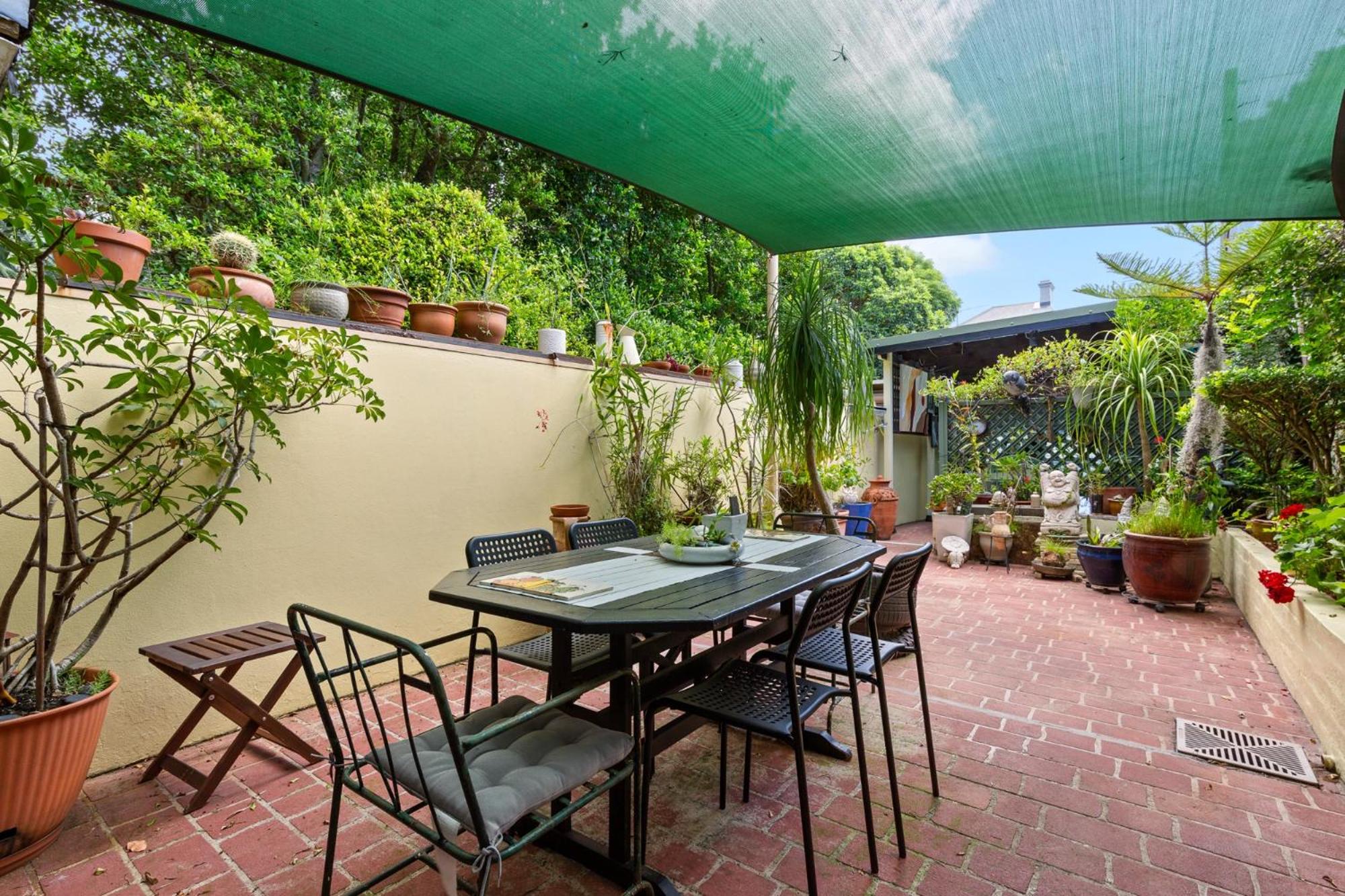 Spacious 2-Bed Townhouse with Garage & Patio