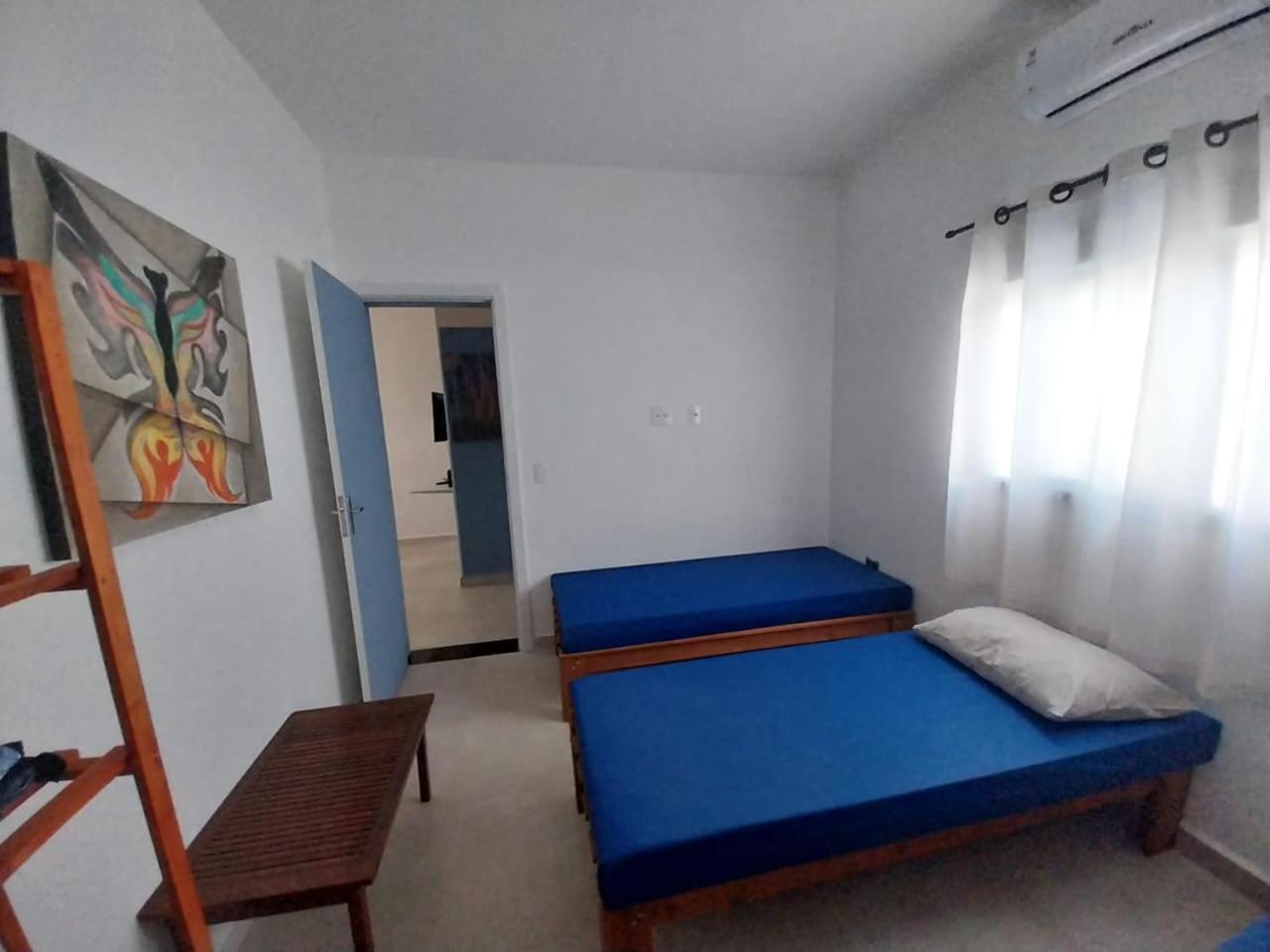 Casa em condomínio no Centro de Bertioga com Ar condicionado