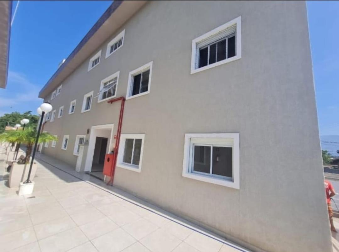 Casa em condomínio no Centro de Bertioga com Ar condicionado