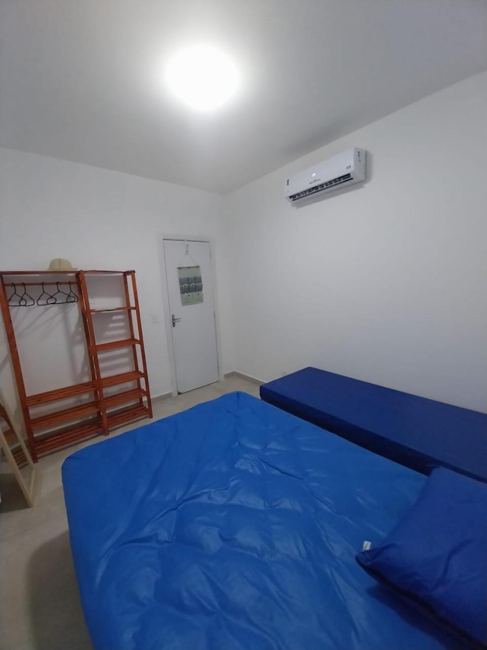 Casa em condomínio no Centro de Bertioga com Ar condicionado