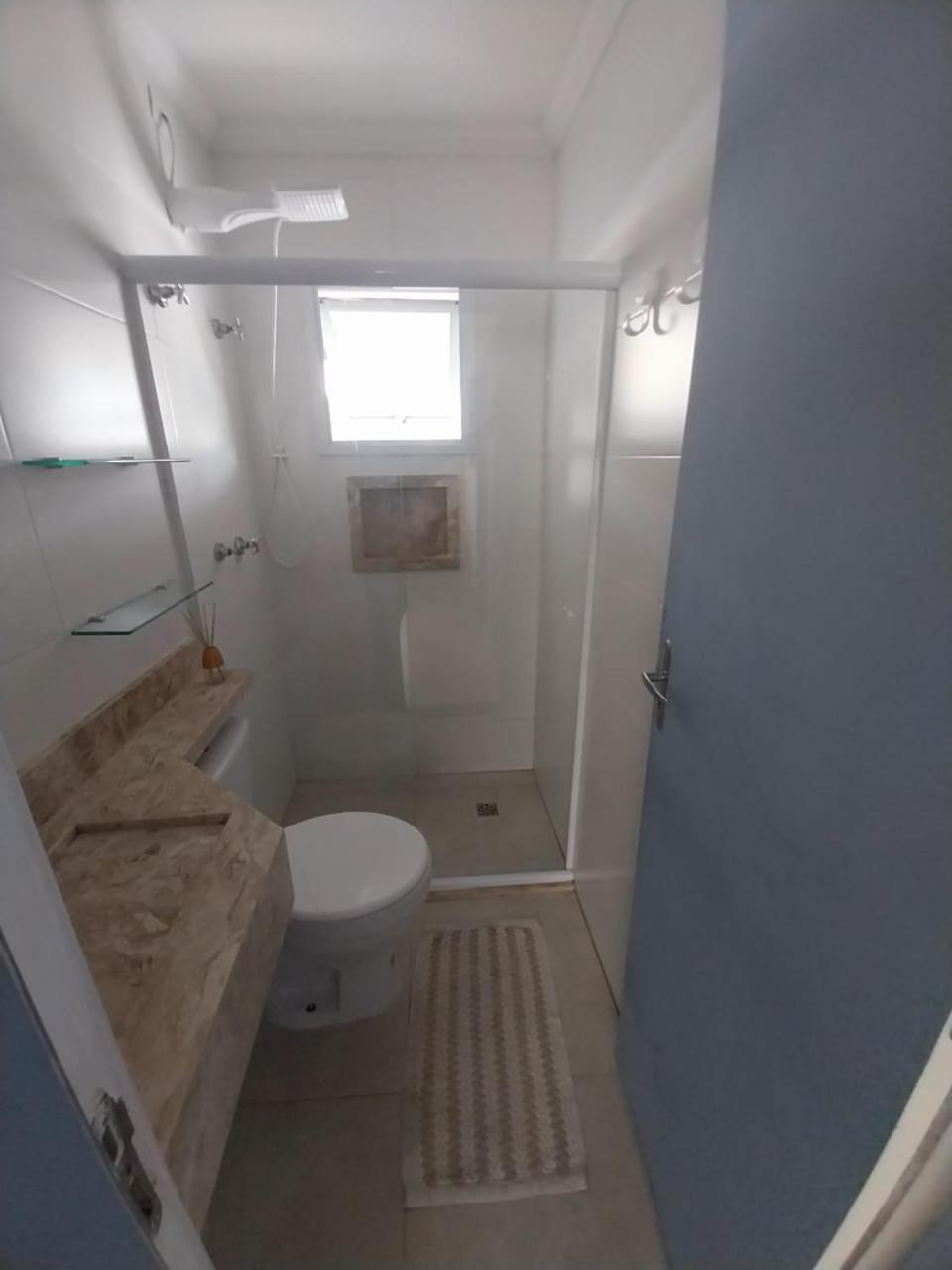 Casa em condomínio no Centro de Bertioga com Ar condicionado