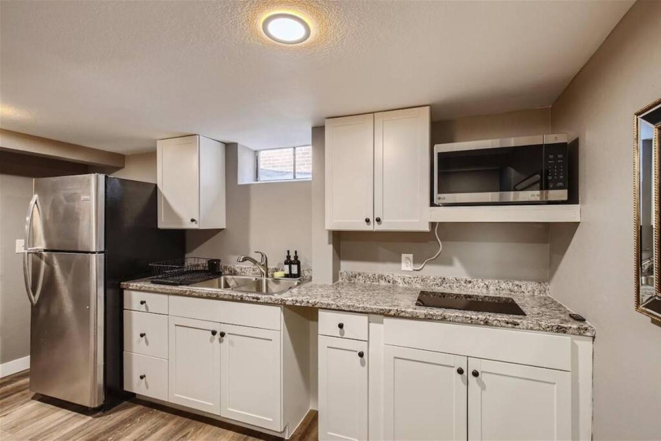 Basement Guest Suite With A Pool Table A Hot Tub And A TV