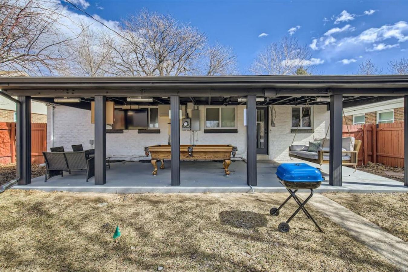 Basement Guest Suite With A Pool Table A Hot Tub And A TV