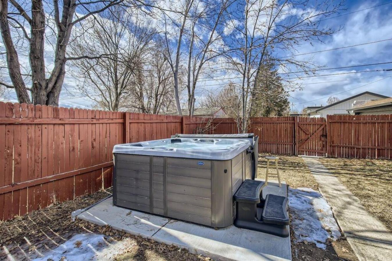 Basement Guest Suite With A Pool Table A Hot Tub And A TV