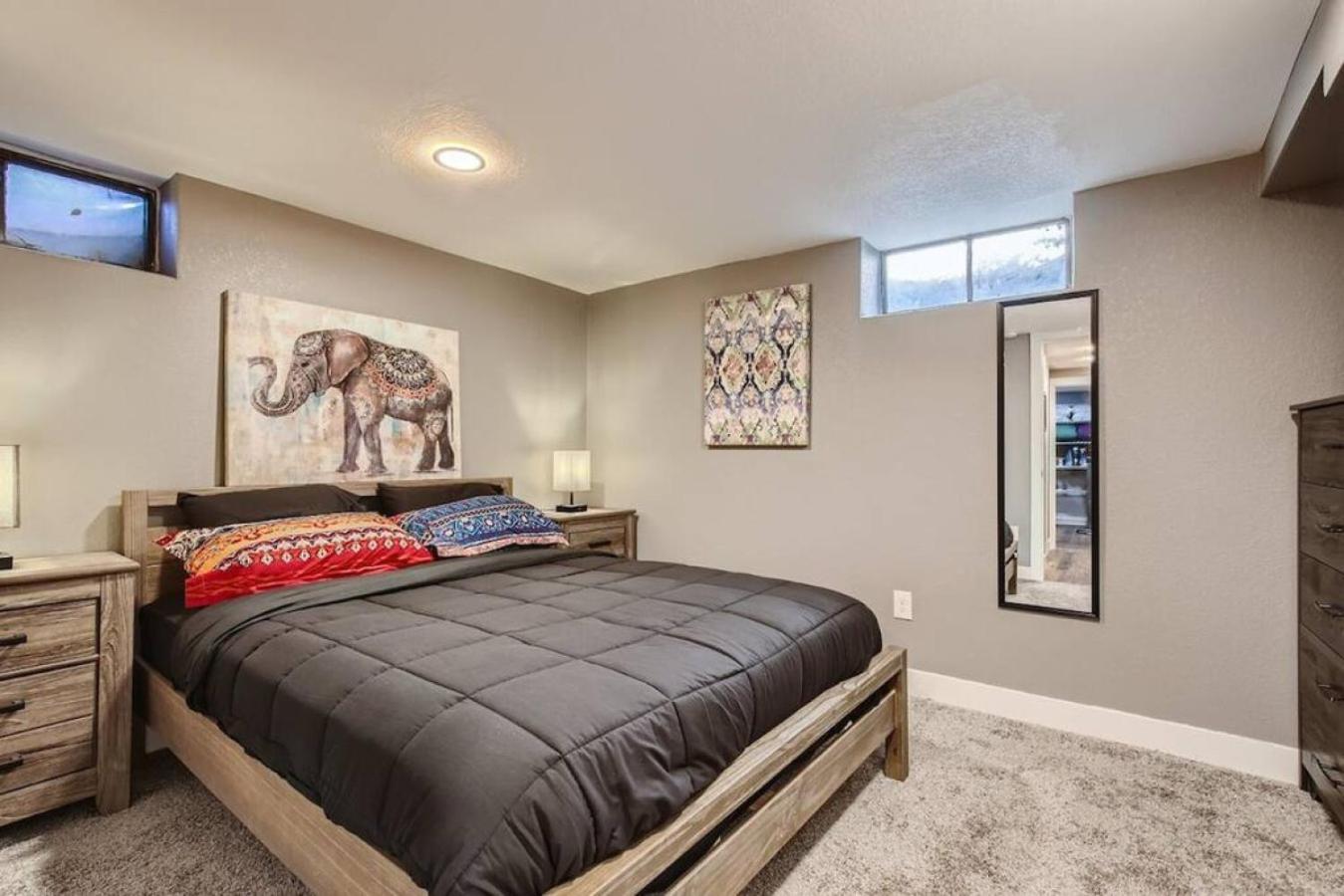 Basement Guest Suite With A Pool Table A Hot Tub And A TV