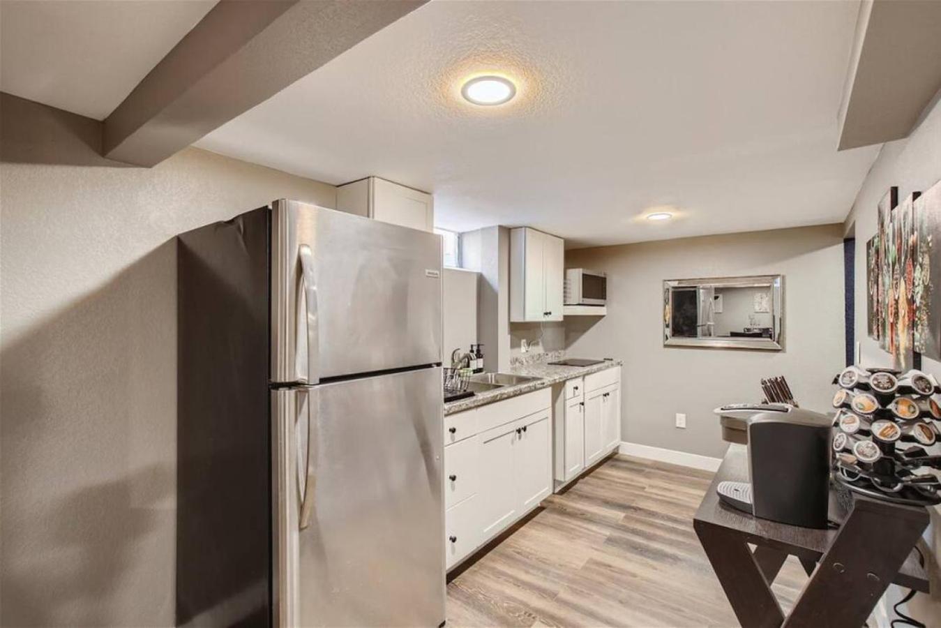 Basement Guest Suite With A Pool Table A Hot Tub And A TV