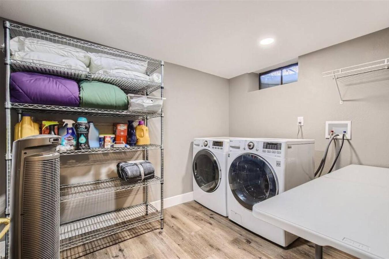 Basement Guest Suite With A Pool Table A Hot Tub And A TV