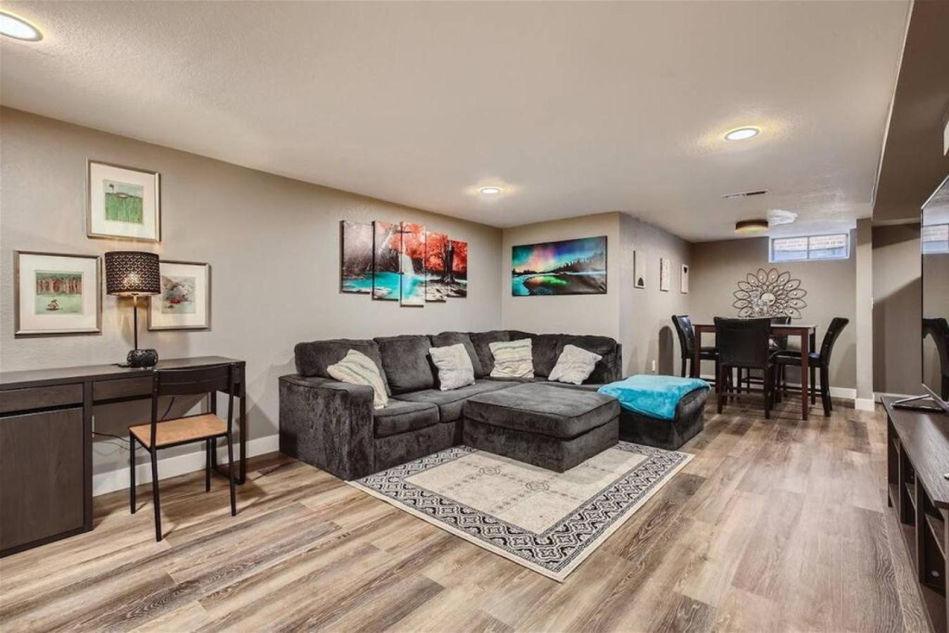 Basement Guest Suite With A Pool Table A Hot Tub And A TV