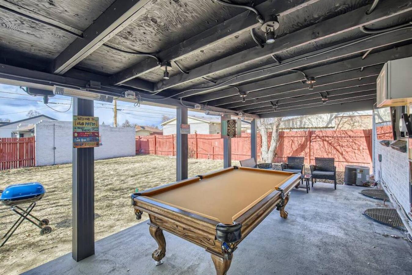 Basement Guest Suite With A Pool Table A Hot Tub And A TV