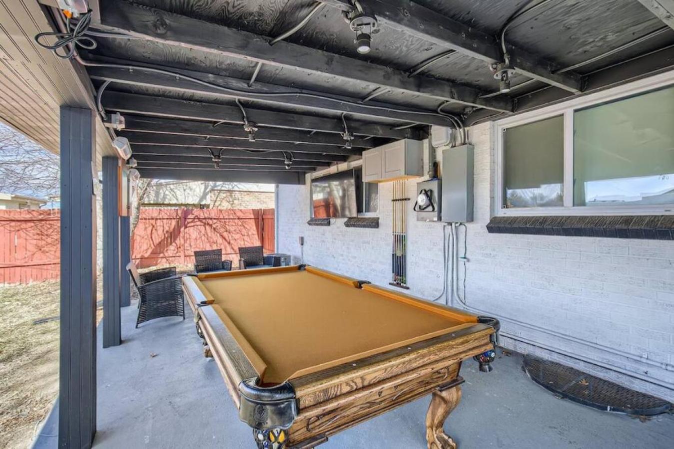 Basement Guest Suite With A Pool Table A Hot Tub And A TV