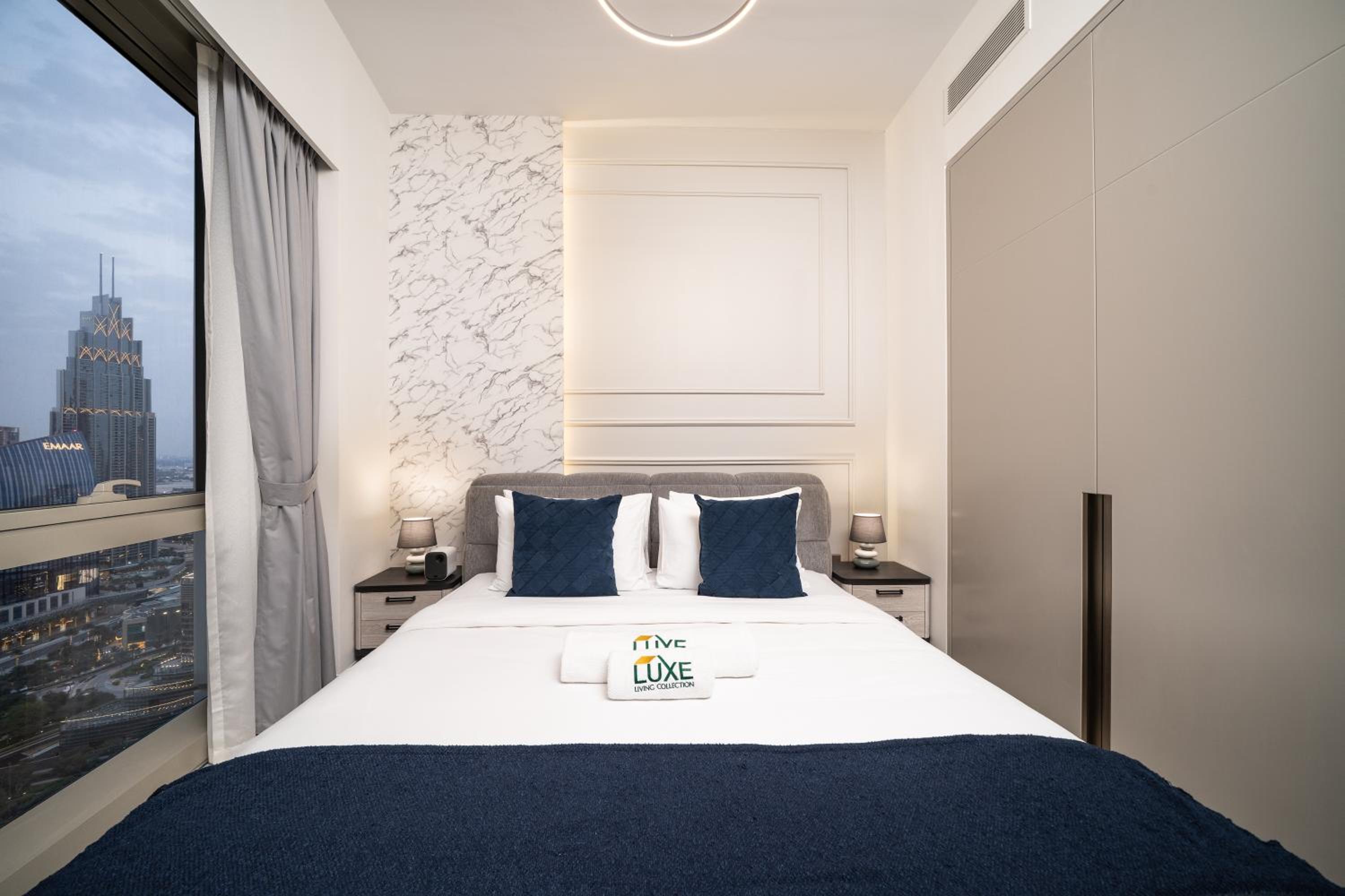 Luxe Living at Grande Signature - Burj Khalifa and Sea Views - Brand New
