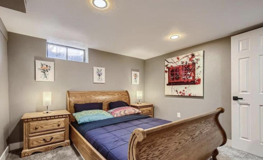 Basement Guest Suite With A Pool Table A Hot Tub And A TV
