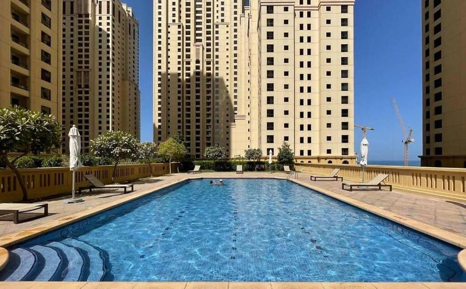 Beachside Bliss with Partial Sea View Gym and Pool