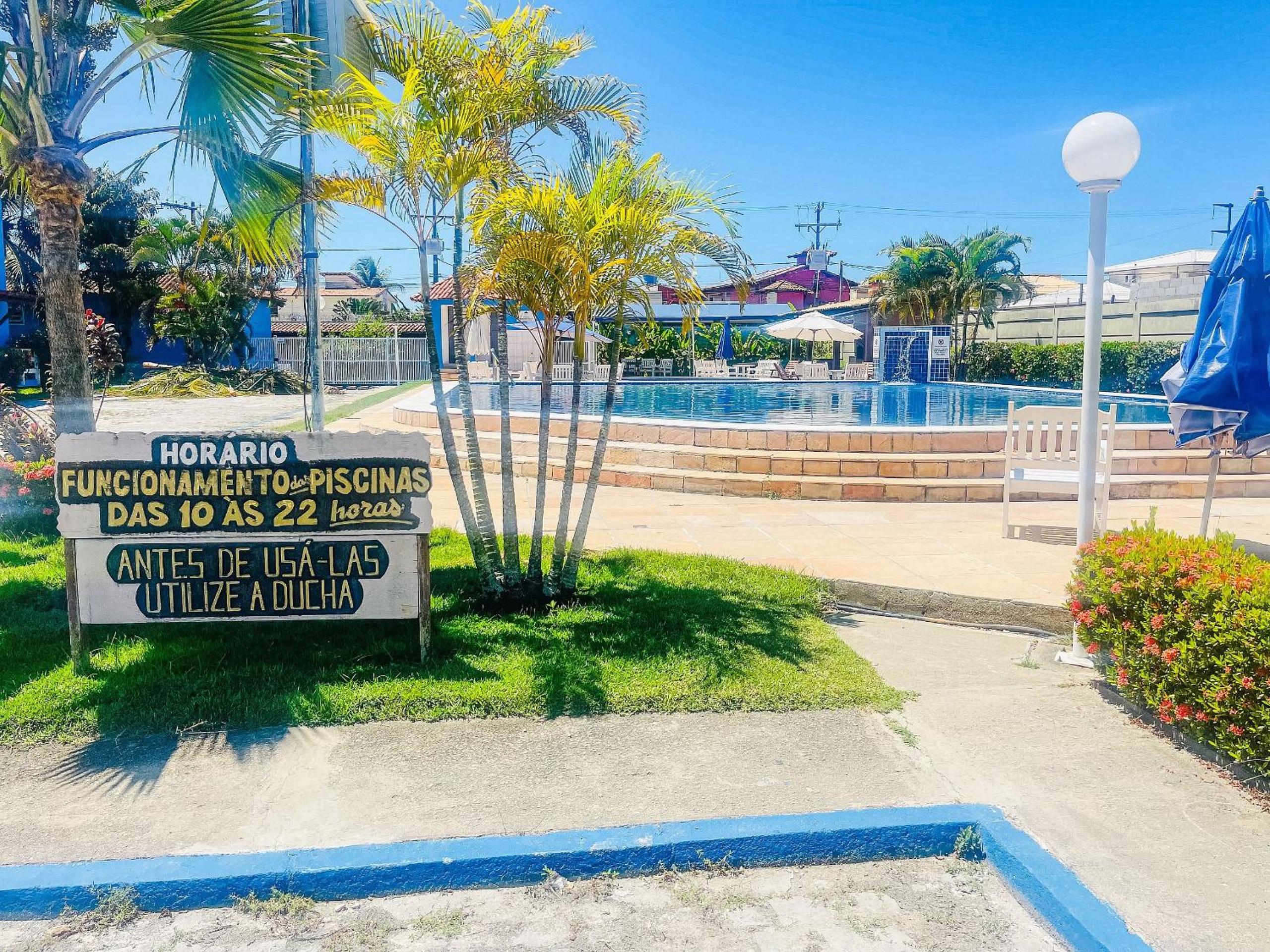 Condomínio Golden Dolphin a uma quadra do Axé Mói, com piscina, churrasqueira, portaria 24hrs, de frente à supermercado, e centro gastronômico