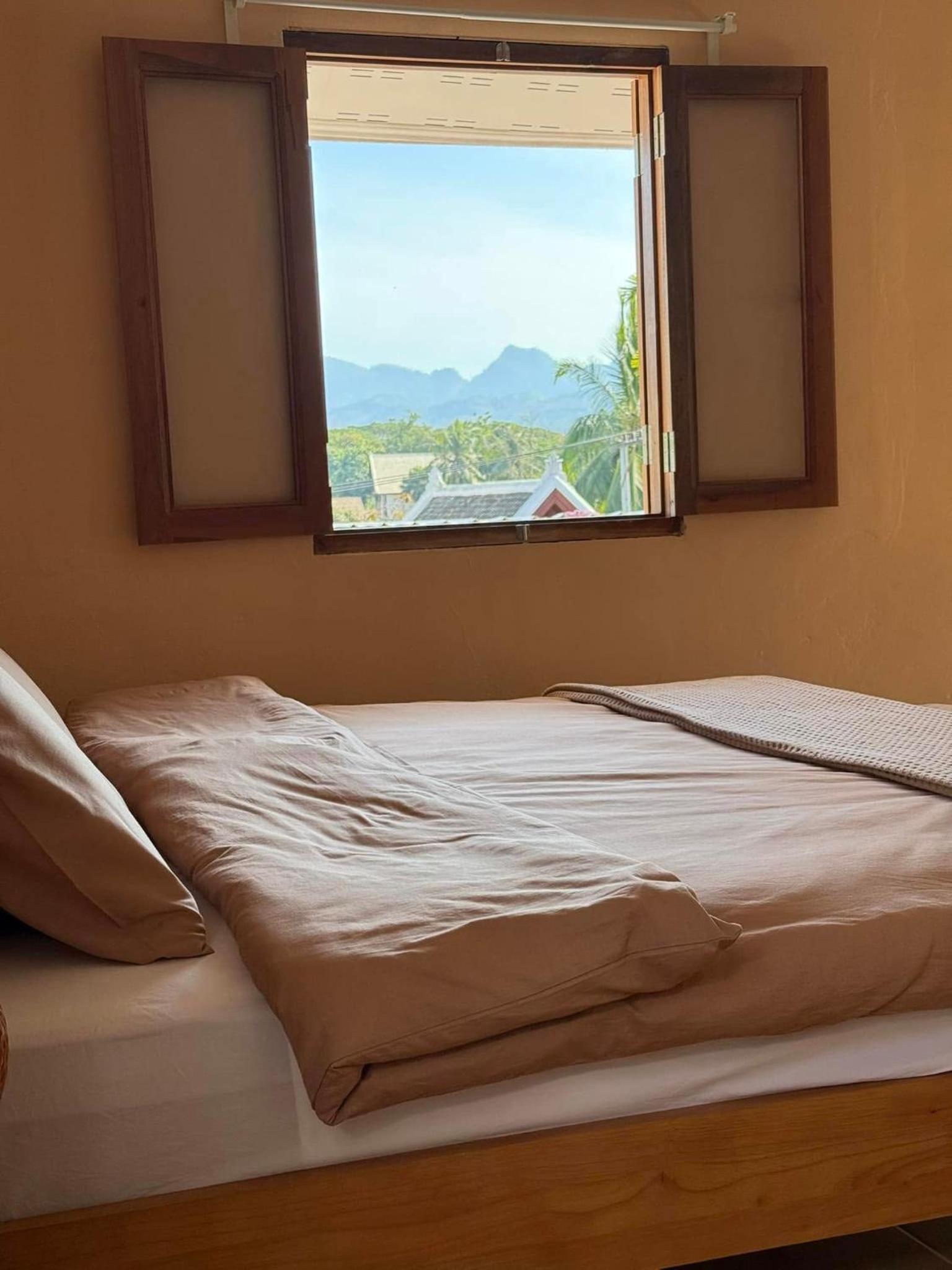 YAIMAII HOME-A tranquil stay in the heart of Luang Prabang