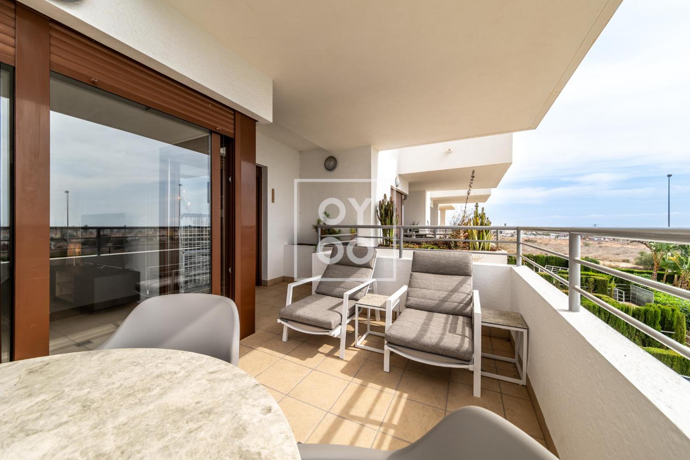 La Brisa del Mar apt with sea view, terrace, pool - by OYOOSTAYS