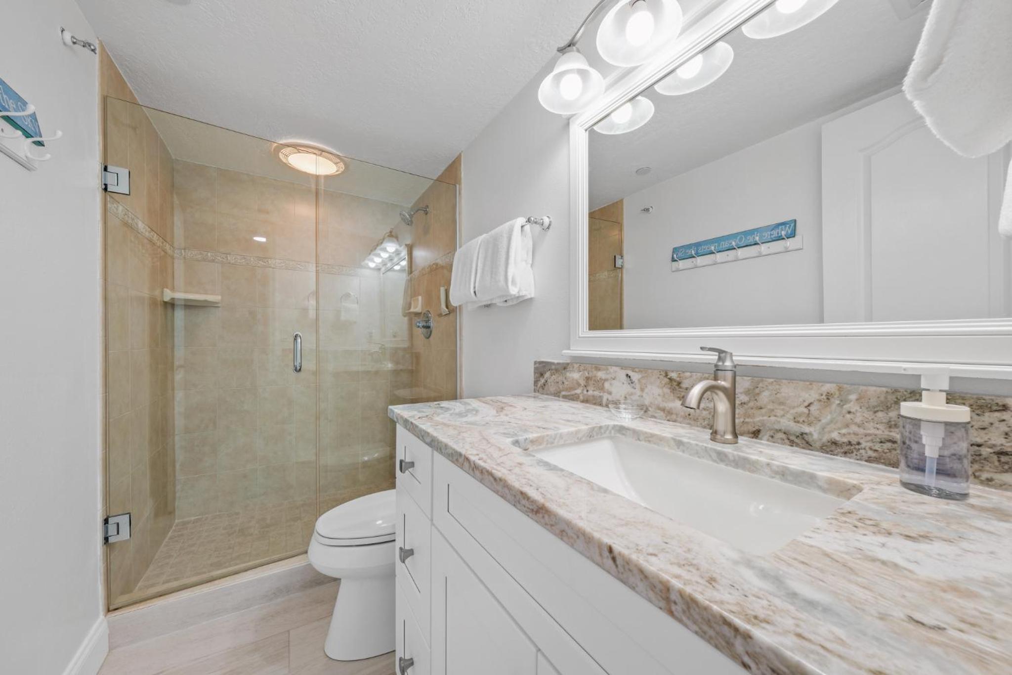 Corner oceanfront views with wrap around balcony located on the no-drive beach!