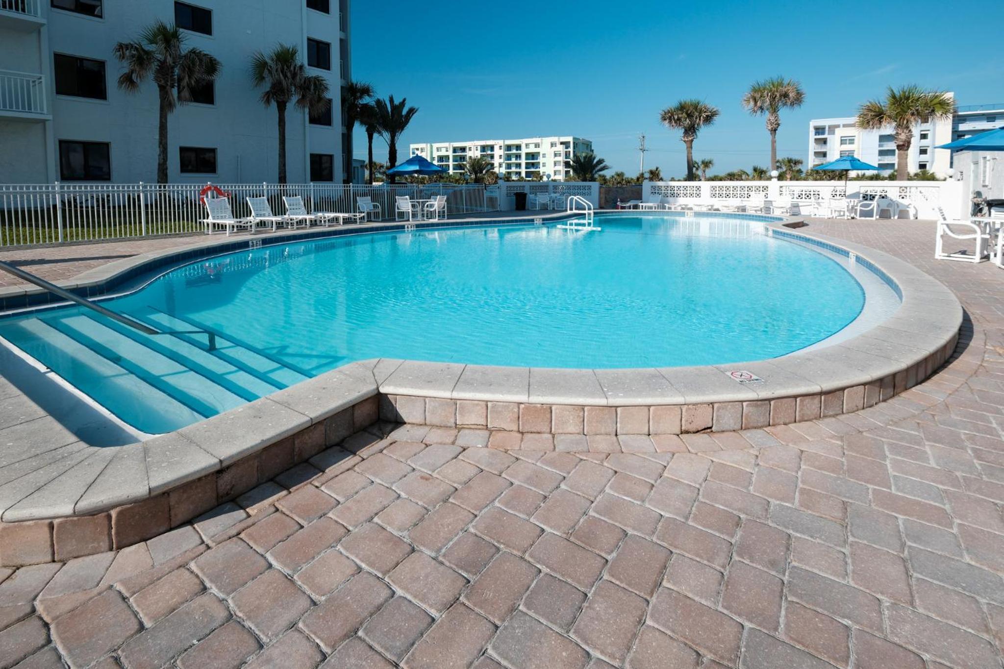 Corner oceanfront views with wrap around balcony located on the no-drive beach!