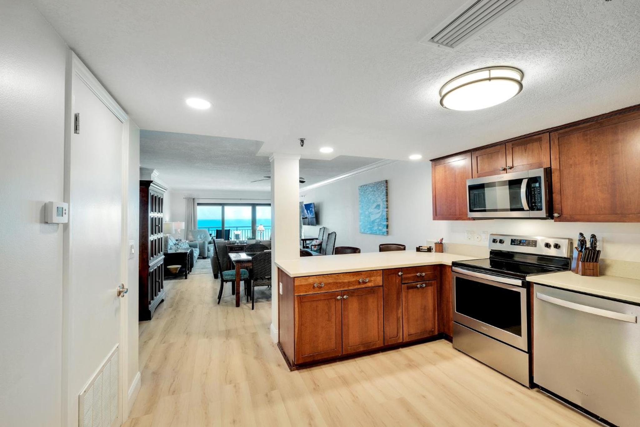 Large oceanfront balcony with pool & beach access located on the no-drive beach!