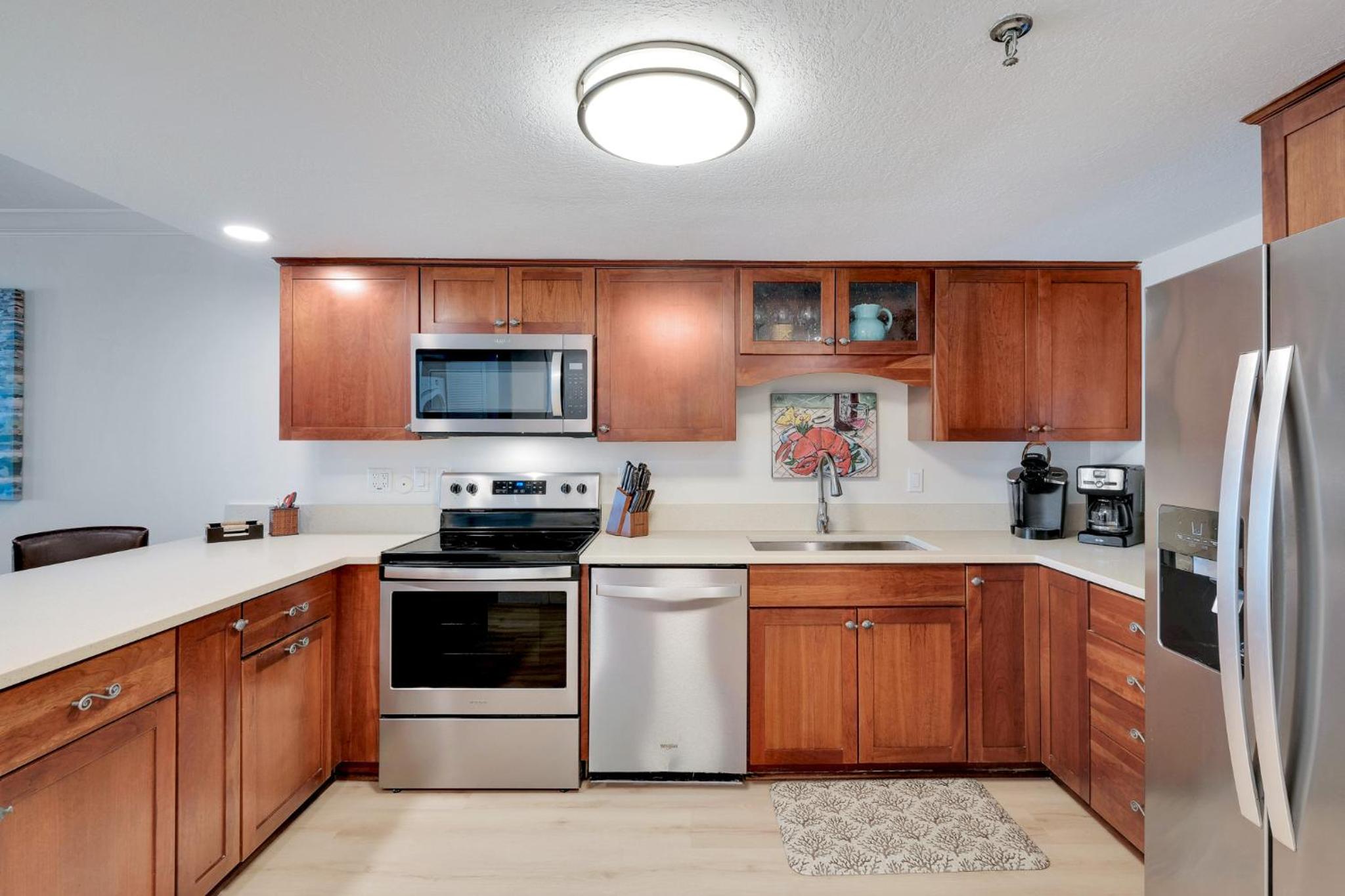 Large oceanfront balcony with pool & beach access located on the no-drive beach!