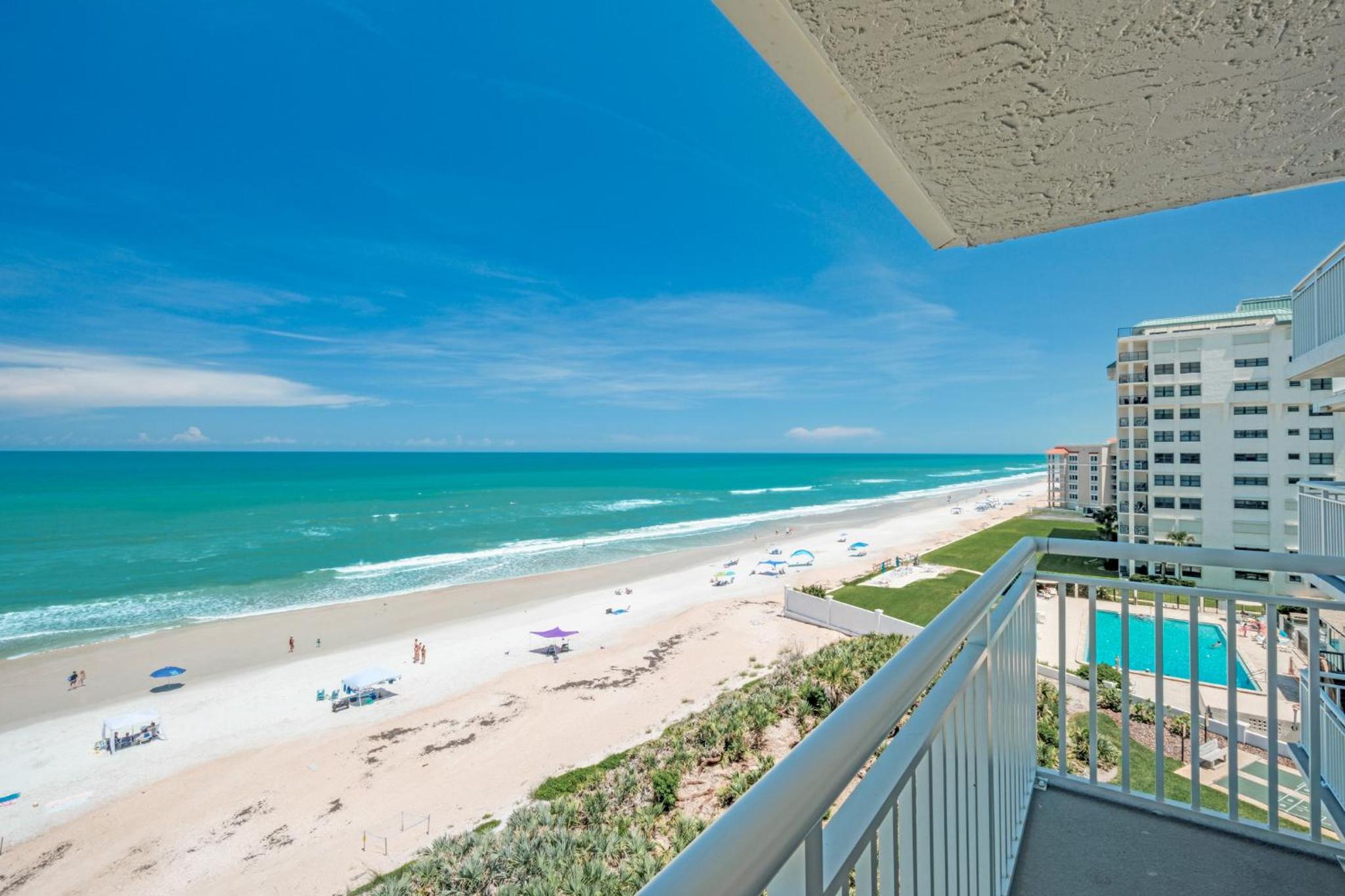 Large oceanfront balcony with pool & beach access located on the no-drive beach!