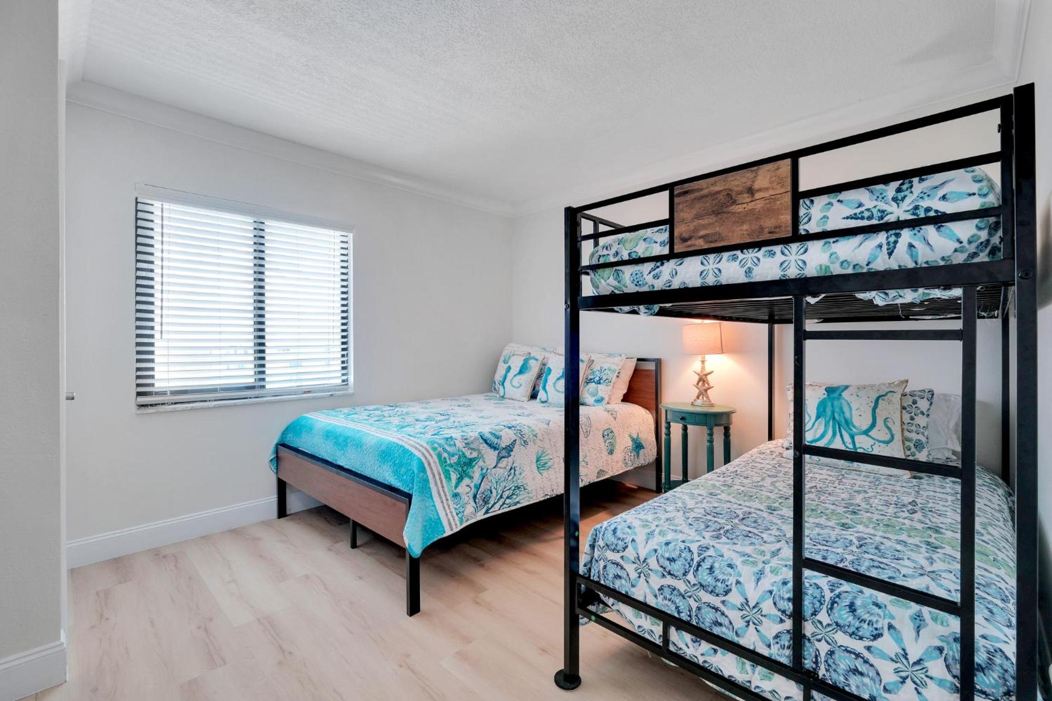 Large oceanfront balcony with pool & beach access located on the no-drive beach!