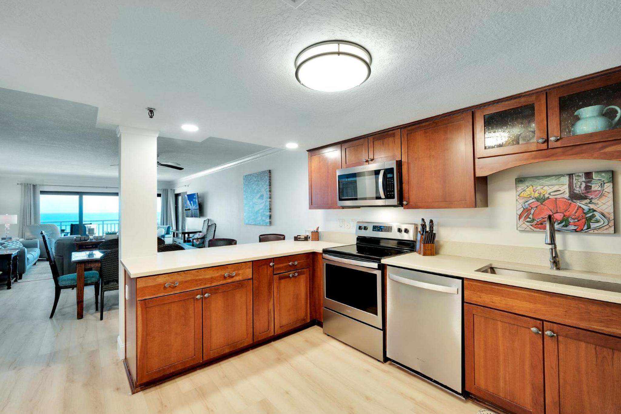 Large oceanfront balcony with pool & beach access located on the no-drive beach!