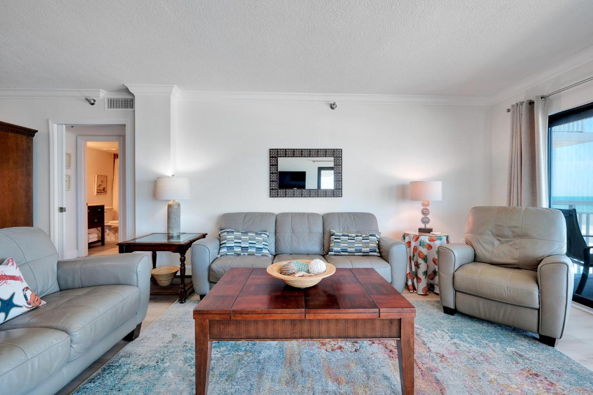 Large oceanfront balcony with pool & beach access located on the no-drive beach!
