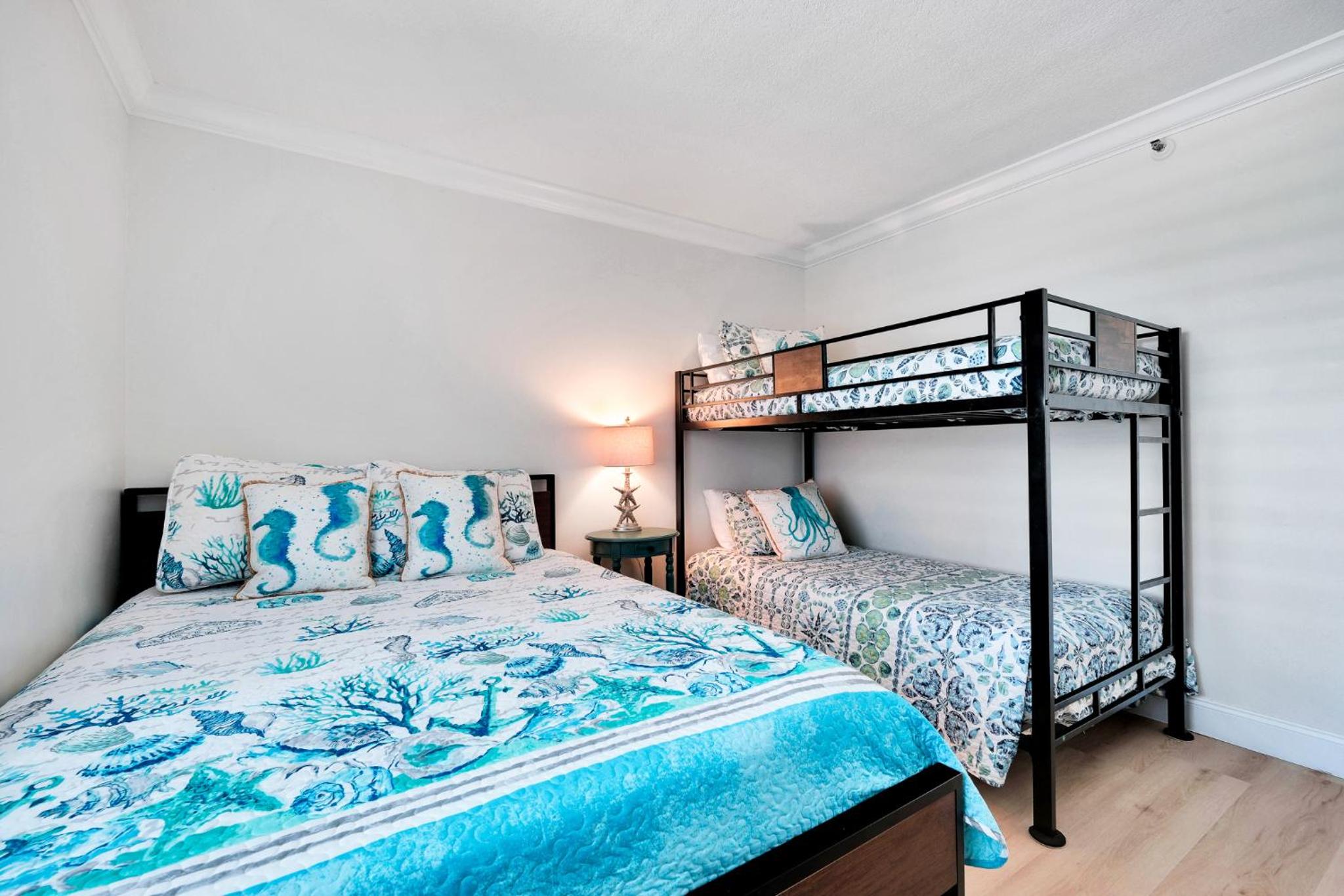 Large oceanfront balcony with pool & beach access located on the no-drive beach!