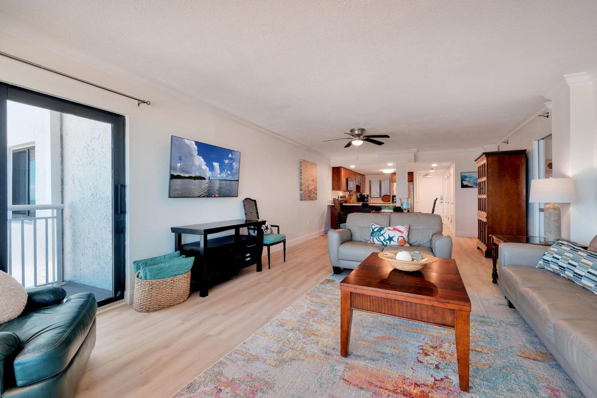 Large oceanfront balcony with pool & beach access located on the no-drive beach!