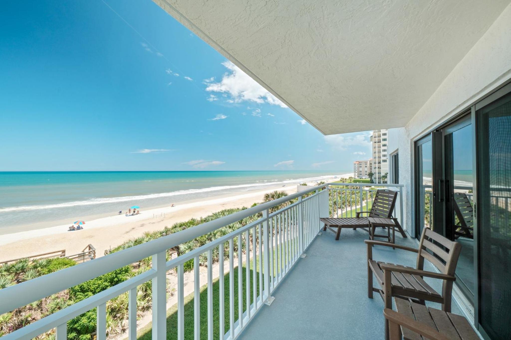 Oceanfront corner views with wrap around balcony and complex pool