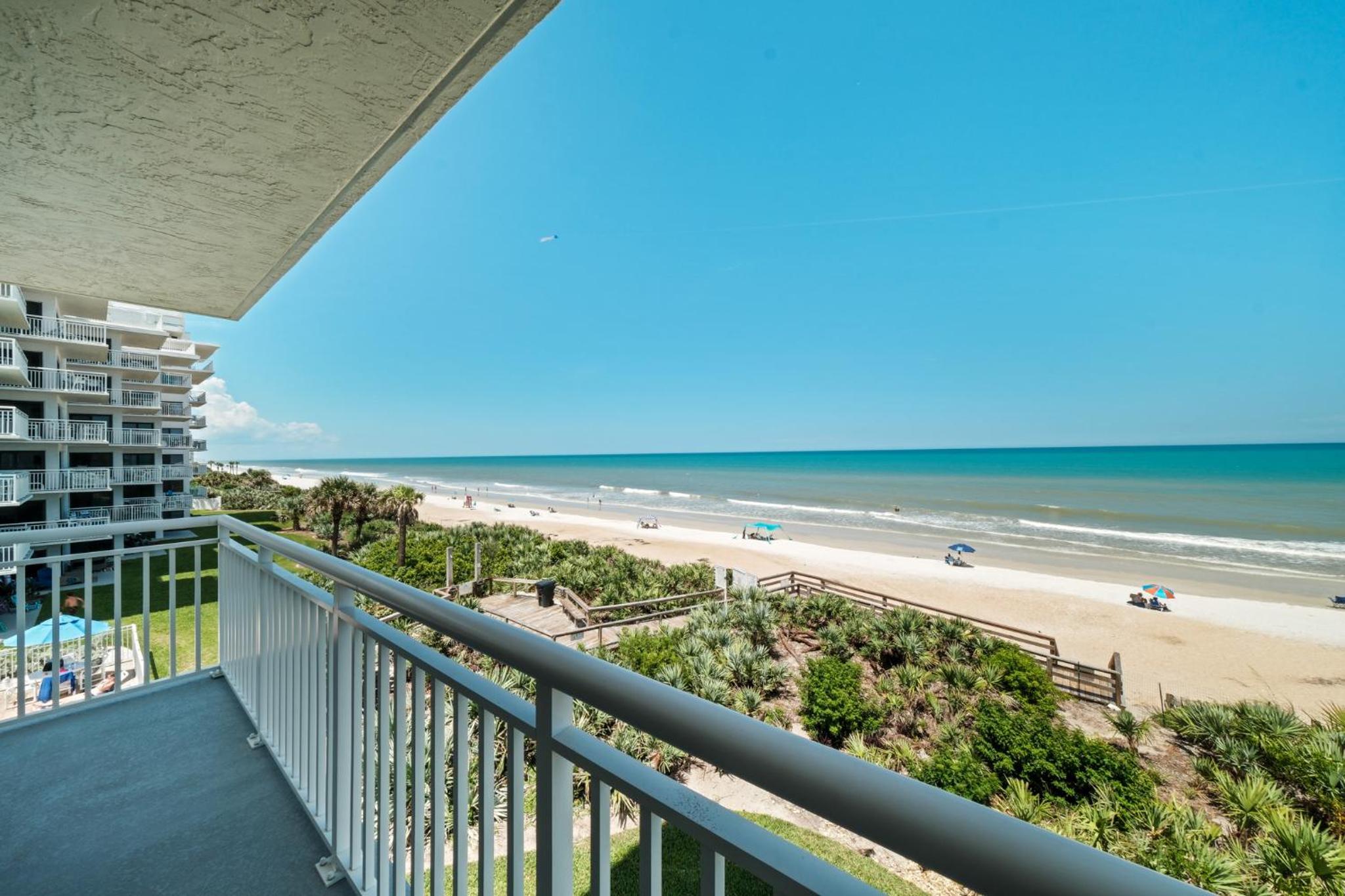 Oceanfront corner views with wrap around balcony and complex pool