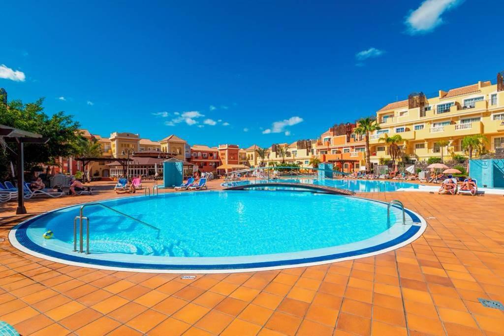 Prime Las Americas Getaway - Apartment with Huge Private Terrace & Pool Access
