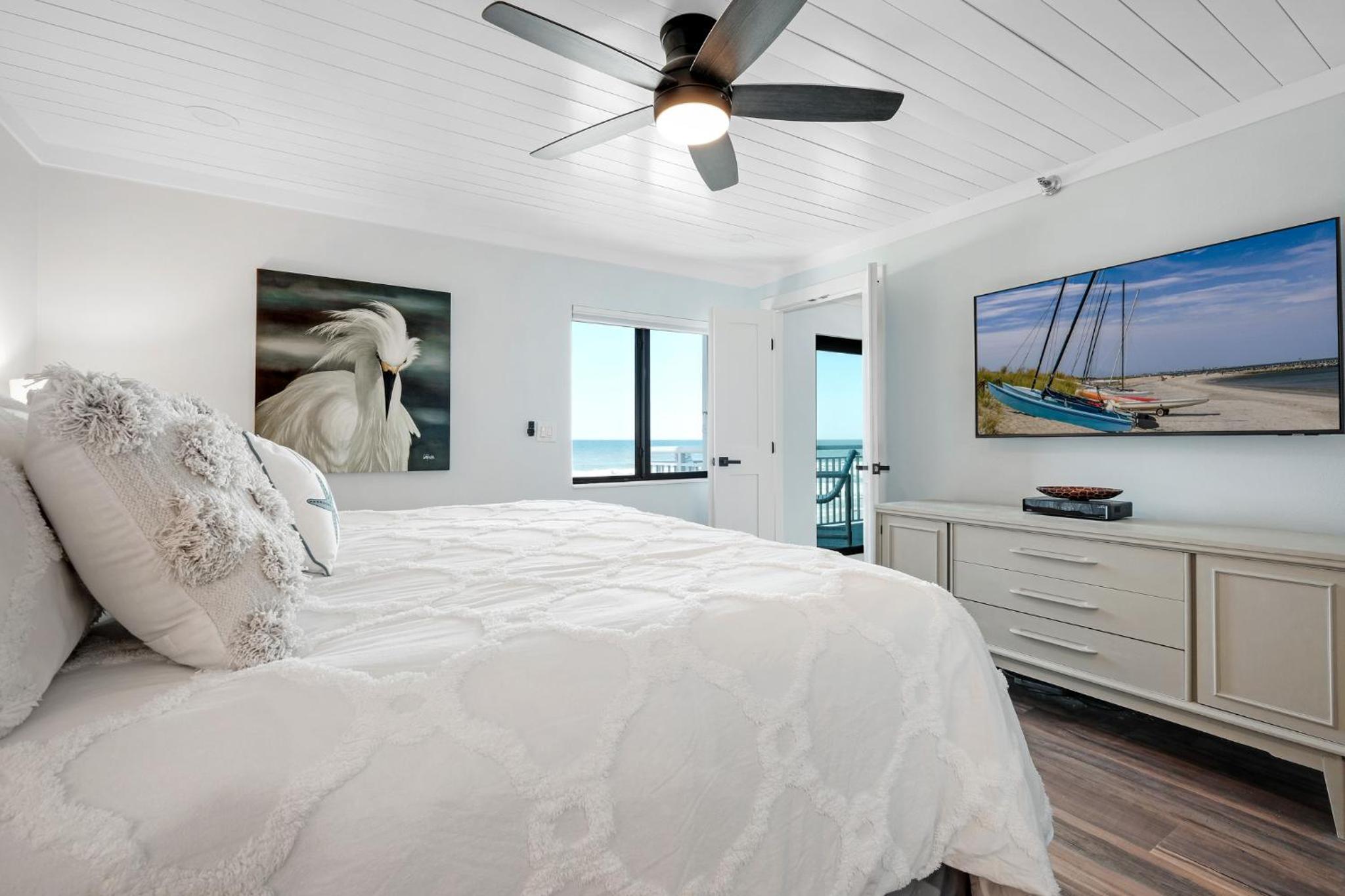 Large balcony with direct oceanfront views and access to complex pool