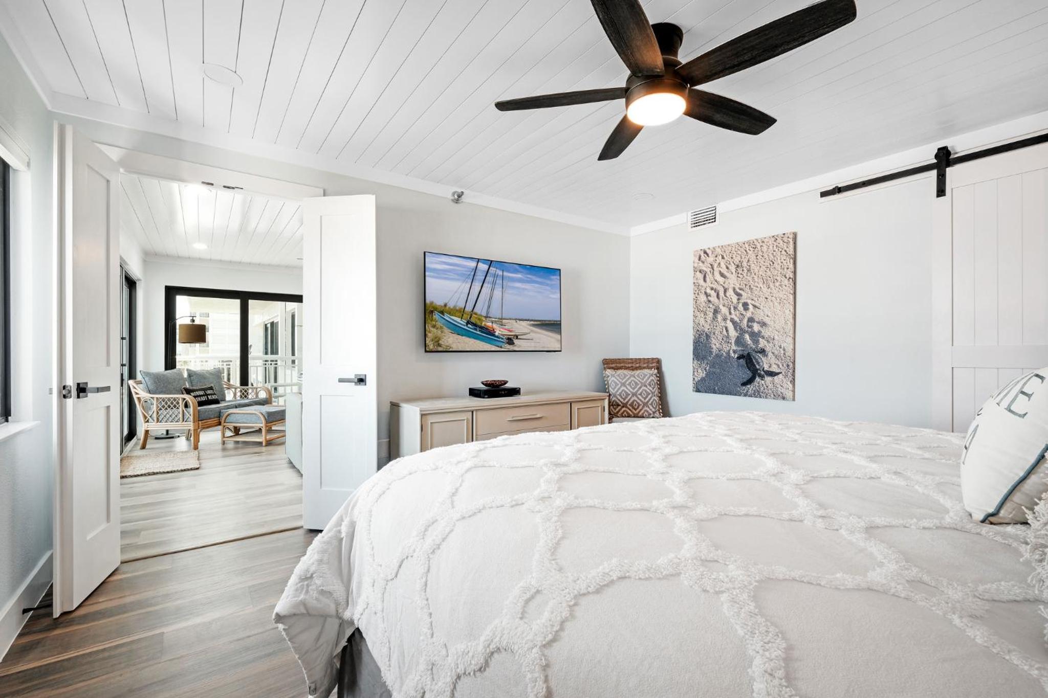 Large balcony with direct oceanfront views and access to complex pool