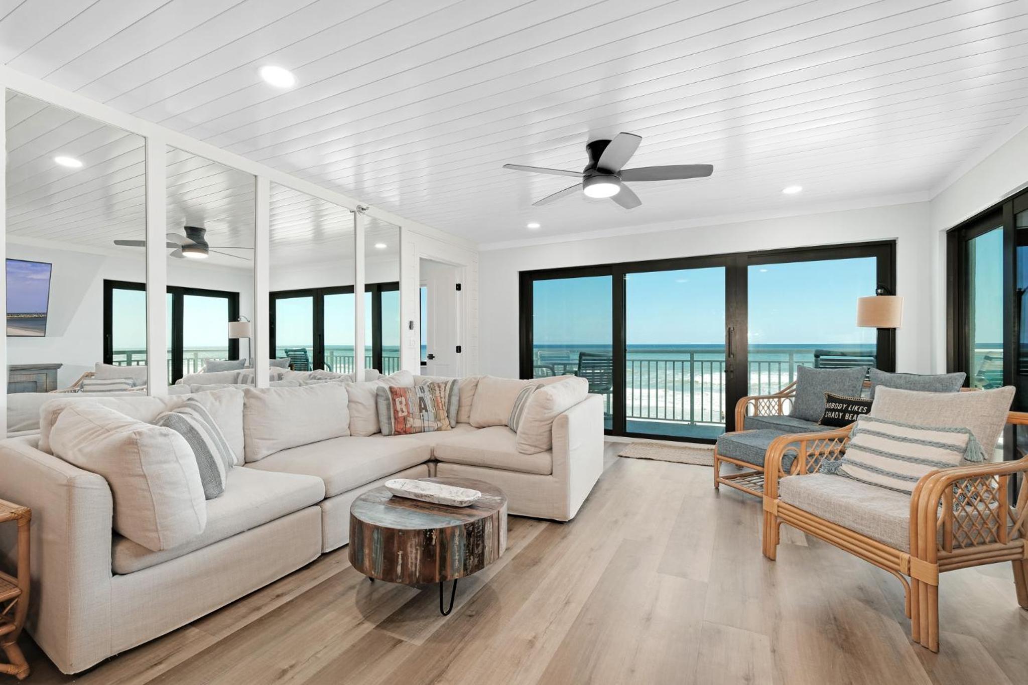Large balcony with direct oceanfront views and access to complex pool