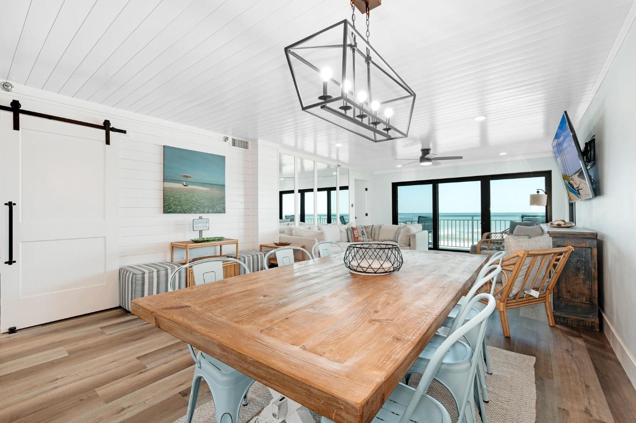 Large balcony with direct oceanfront views and access to complex pool