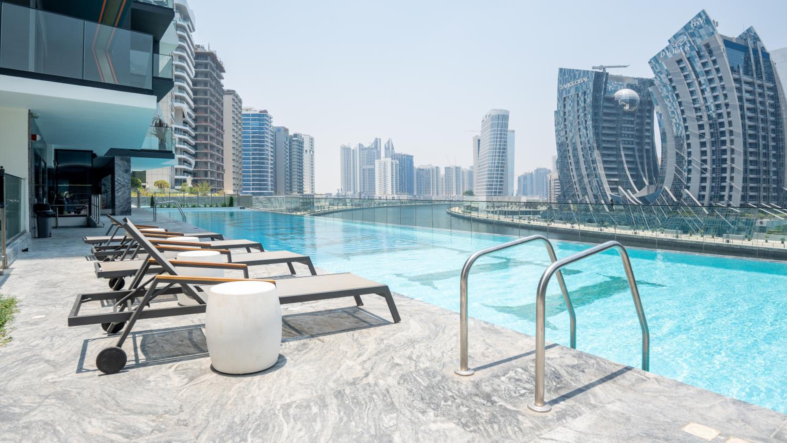 Keyrock Binghatti Canal - Hot Tub, Pool & Gym Access