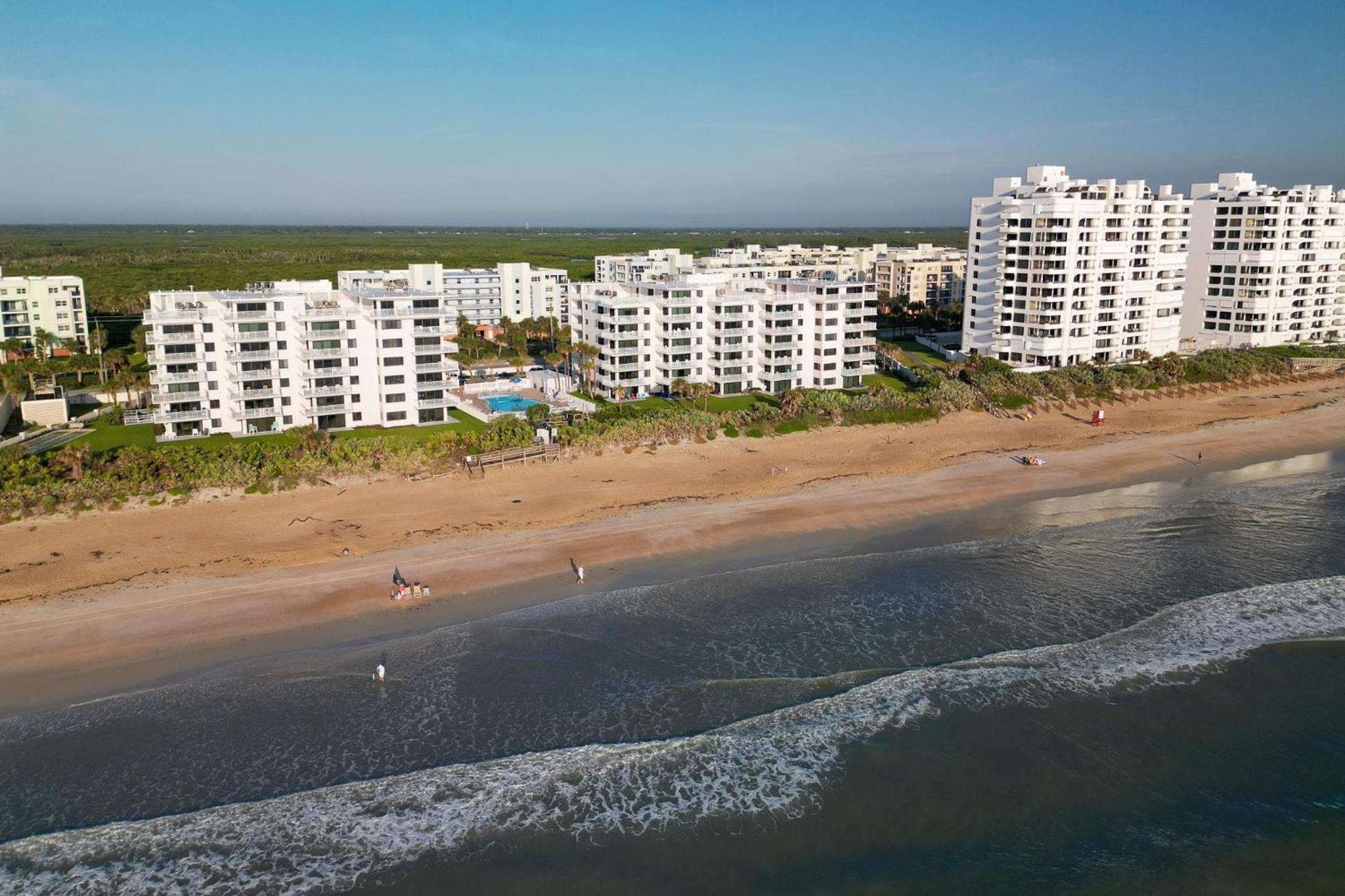 Take in the oceanfront corner views located on the no-drive beach!