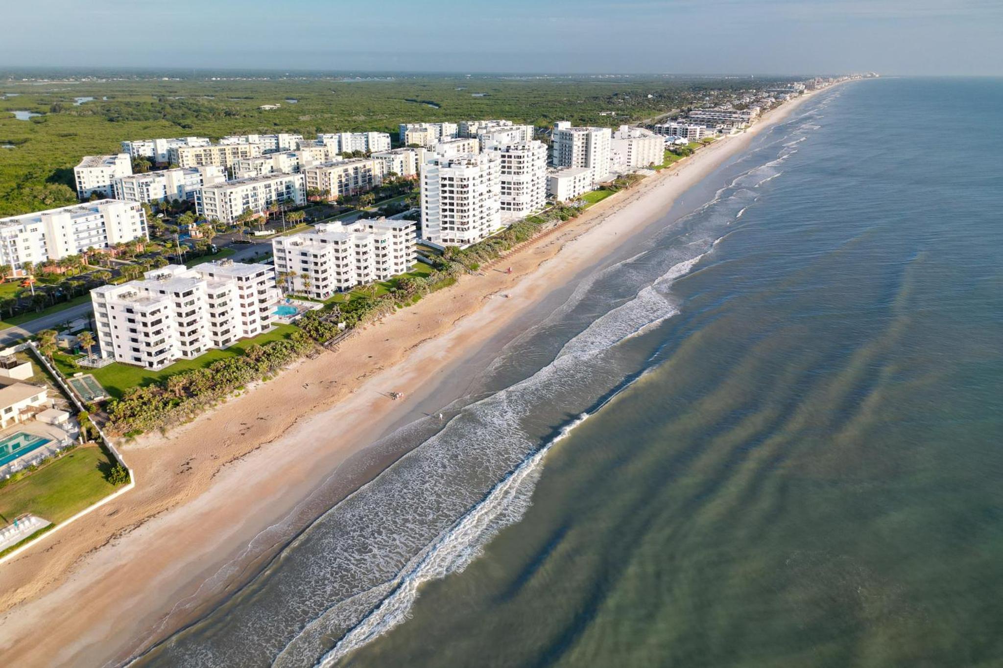 Oceanfront with pool & beach access located on the no-drive beach!