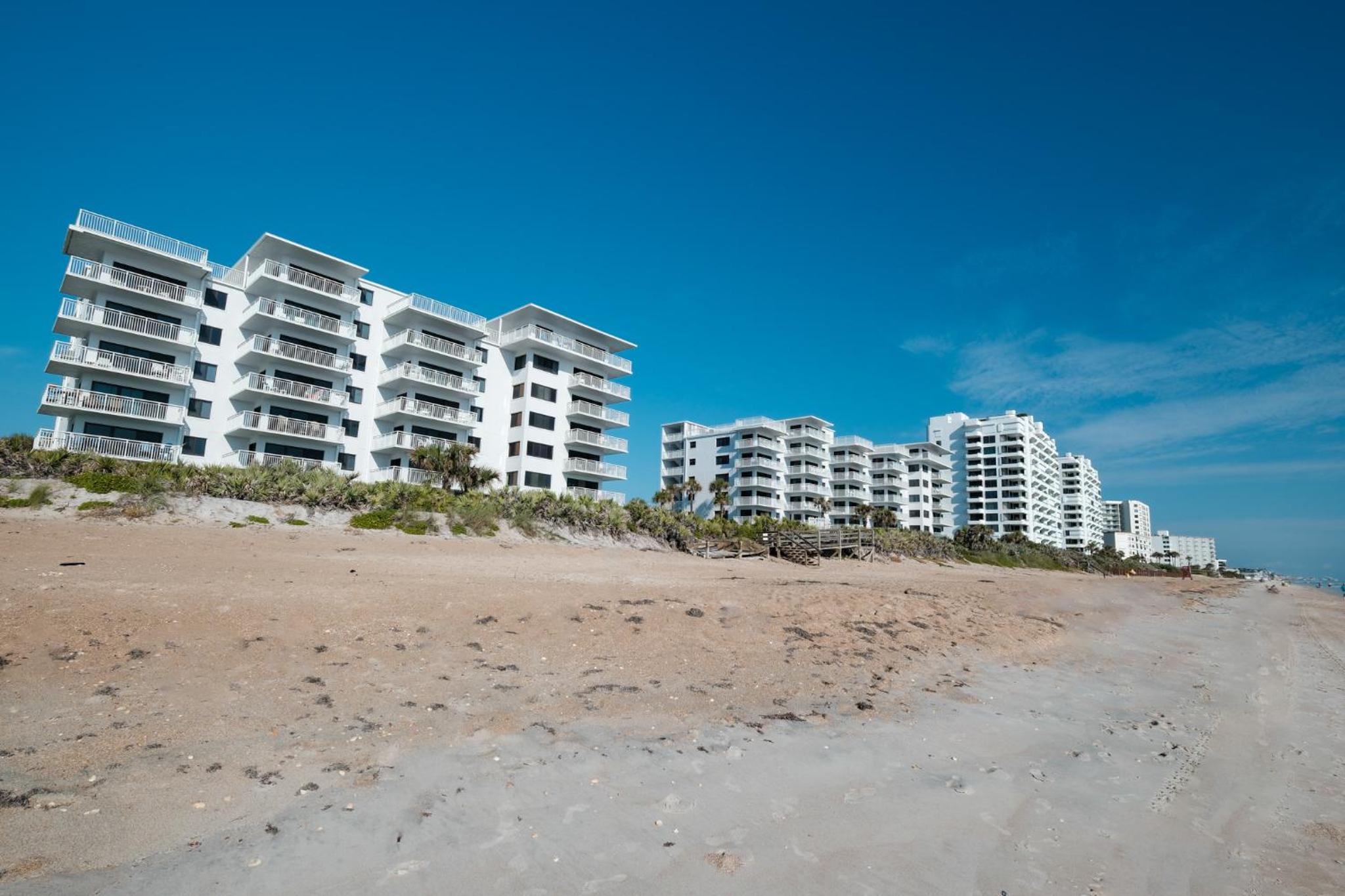 Oceanfront with pool & beach access located on the no-drive beach!