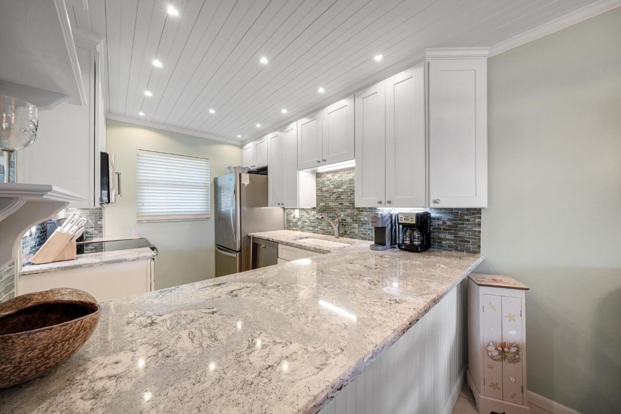 Top Floor Ocean and Pool Views located on No-Drive Beach with 2 Complex Pools