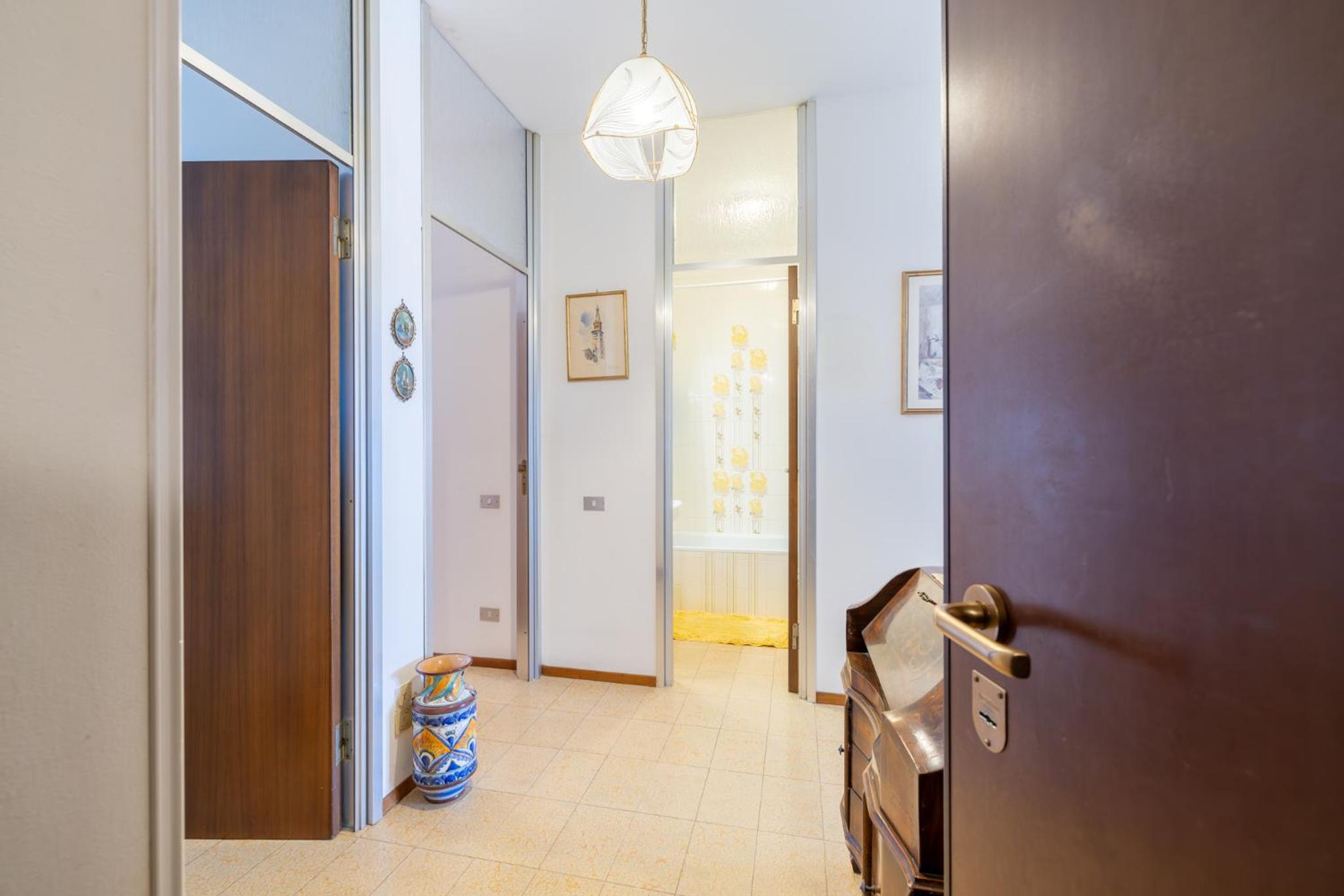 Mina House - Appartamento Fronte Mare con Ampia Terrazza e Garage